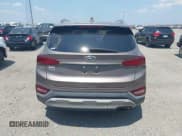 ✅ 2020 Hyundai Santa Fe SEL • VIN: 5NMS33AD3LH261307 • Lot: 42940601. Listed on IAAI with 95,444 mi. Free auction sales archive from the USA and detailed vehicle history report at DreamBid. Image 16.