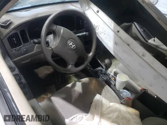 2006 Hyundai Elantra GLS с VIN KMHDN46D56U346935, выставлен на аукционе Copart как лот 71787674 с пробегом Не указан миль и Списание • Salvage title. История ставок и продаж доступна на DreamBid. Изображение 8.