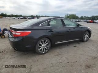 ✅ 2013 Hyundai Azera • VIN: KMHFH4JG5DA316804 • Лот: 57532975. Опубликован ранее на Copart с пробегом 243 038 миль. Бесплатный доступ к архиву аукционных продаж из США и подробный отчёт об истории автомобиля на DreamBid. Изображение 3.