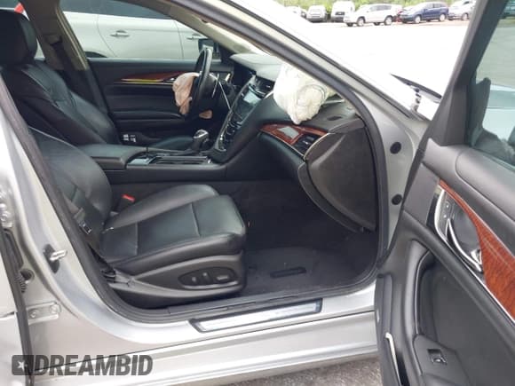 ✅ 2015 Cadillac CTS AWD • VIN: 1G6AW5SX3F0142431 • Lot: 43027413. Listed on IAAI with 125,276 mi. Free auction sales archive from the USA and detailed vehicle history report at DreamBid. Image 5.