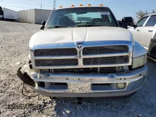 2002 Dodge 3500 z VIN 3B7MC33C32M293036, wystawiony jako Copart lot #77405204 z przebiegiem Nie podano mil oraz Szkoda całkowita • Salvage title. Historia ofert i sprzedaży dostępna na DreamBid. Obrazek 5.