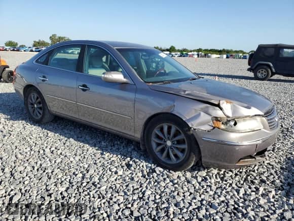 2007 Hyundai Azera SE с VIN KMHFC46F87A164195, выставлен на аукционе Copart как лот 52500115 с пробегом 191 835 миль миль и Списание • Salvage title. История ставок и продаж доступна на DreamBid. Изображение 4.