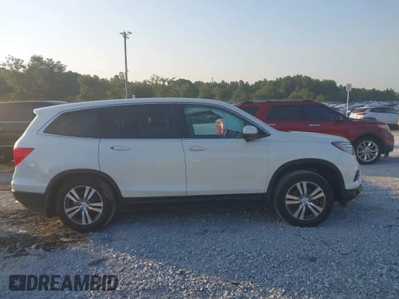 ✅ 2017 Honda Pilot EX-L • VIN: 5FNYF5H7XHB014193 • Lot: 43040443. Listed on IAAI with 246,920 mi. Free auction sales archive from the USA and detailed vehicle history report at DreamBid. Image 13.