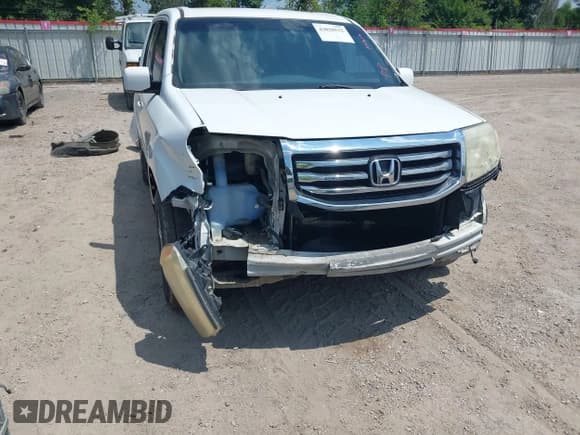 ✅ 2012 Honda Pilot EX • VIN: 5FNYF3H41CB024582 • Lot: 43018532. Listed on IAAI with 263,864 mi. Free auction sales archive from the USA and detailed vehicle history report at DreamBid. Image 6.