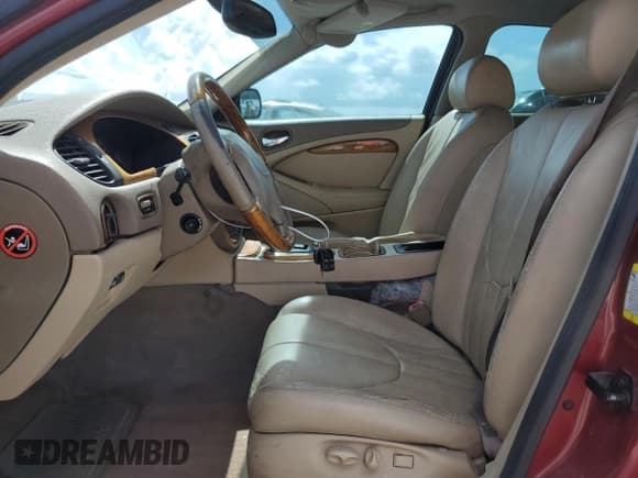 ✅ 2000 Jaguar S-Type V6 • VIN: SAJDA01C5YFL24451 • Lot: 61364055. Wystawiony na Copart z przebiegiem 142 296 mil. Bezpłatny archiwum sprzedaży aukcyjnych z USA i szczegółowy raport historii pojazdu na DreamBid. Zdjęcie 7.