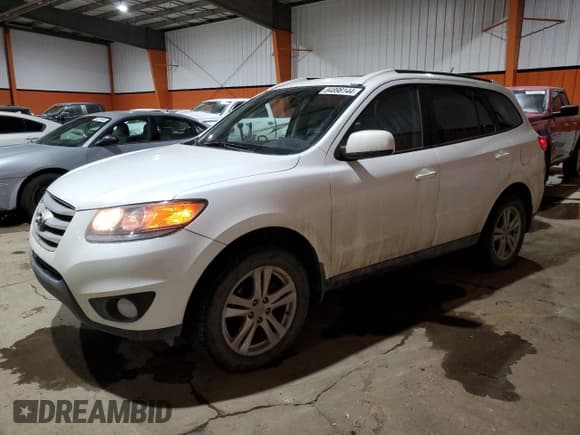 ✅ 2012 Hyundai Santa Fe GLS • VIN: 5XYZGDAG6CG113424 • Lot: 84898144. Listed on Copart with 140,697 mi. Free auction sales archive from the USA and detailed vehicle history report at DreamBid. Image 1.