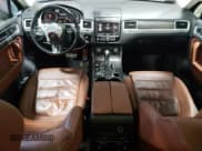 ✅ 2017 Volkswagen Touareg Executive • VIN: WVGGF7BP5HD001497 • Lot: 39641554. Listed on Copart with 81,525 mi. Free auction sales archive from the USA and detailed vehicle history report at DreamBid. Image 8.