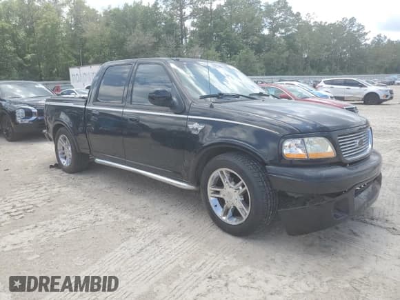 ✅ 2003 Ford F-150 Harley-Davidson • VIN: 1FTRW07393KC28559 • Lot: 55201835. Listed on Copart with 139,288 mi. Free auction sales archive from the USA and detailed vehicle history report at DreamBid. Image 4.