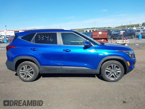 ✅ 2023 Kia Seltos S • VIN: KNDEUCAA1P7458909 • Lot: 43453346. Listed on IAAI with 32,833 mi. Free auction sales archive from the USA and detailed vehicle history report at DreamBid. Image 13.