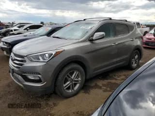 ✅ 2018 Hyundai Santa Fe 2.4L • VIN: 5NMZUDLB4JH067122 • Лот: 63310903. Опубликован ранее на Copart с пробегом 88 561 миль. Бесплатный доступ к архиву аукционных продаж из США и подробный отчёт об истории автомобиля на DreamBid. Изображение 1.