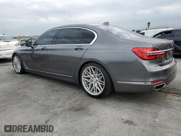 ✅ 2017 BMW 7 Series 740i • VIN: WBA7E2C52HG739390 • Lot: 81669495. Listed on Copart with 124,451 mi. Free auction sales archive from the USA and detailed vehicle history report at DreamBid. Image 2.