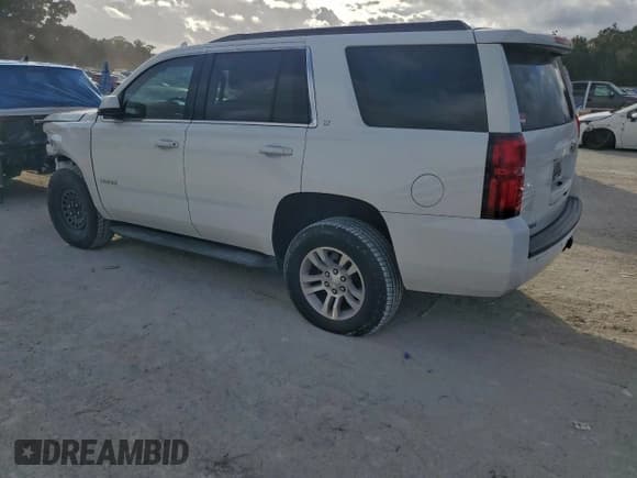 ✅ 2019 Chevrolet Tahoe LT • VIN: 1GNSCBKCXKR180967 • Lot: 94340365. Listed on Copart with 107,454 mi. Free auction sales archive from the USA and detailed vehicle history report at DreamBid. Image 2.