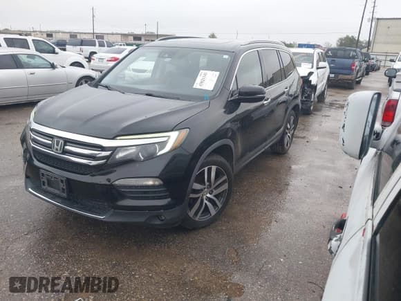 ✅ 2018 Honda Pilot Touring • VIN: 5FNYF5H99JB017044 • Lot: 43821143. Listed on IAAI with 156,739 mi. Free auction sales archive from the USA and detailed vehicle history report at DreamBid. Image 2.