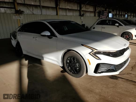 ✅ 2026 Kia K5 LXS • VIN: KNAG24J73T5412932 • Лот: 90932135. Опубликован ранее на Copart с пробегом 2 206 миль. Бесплатный доступ к архиву аукционных продаж из США и подробный отчёт об истории автомобиля на DreamBid. Изображение 4.