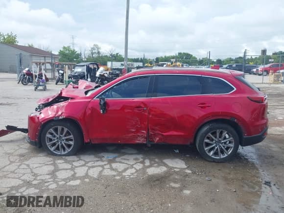 ✅ 2021 Mazda CX-9 Carbon Edition • VIN: JM3TCBDYXM0504844 • Lot: 42714750. Wystawiony na IAAI z przebiegiem Nie podano. Bezpłatny archiwum sprzedaży aukcyjnych z USA i szczegółowy raport historii pojazdu na DreamBid. Zdjęcie 13.