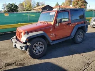 ✅ 2009 Jeep Wrangler X • VIN: 1J4FA24149L707842 • Лот: 85186375. Опубликован ранее на Copart с пробегом 142 001 миль. Бесплатный доступ к архиву аукционных продаж из США и подробный отчёт об истории автомобиля на DreamBid. Изображение 1.