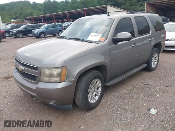 ✅ 2009 Chevrolet Tahoe 2LT • VIN: 1GNFC23019R157707 • Lot: 42751675. Listed on IAAI with 245,494 mi. Free auction sales archive from the USA and detailed vehicle history report at DreamBid. Image 2.