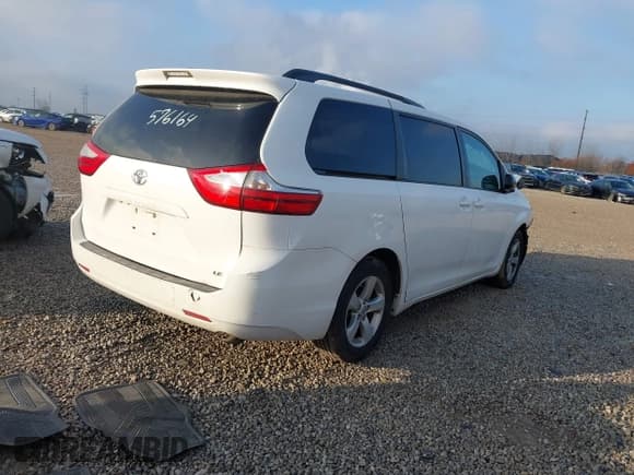 ✅ 2015 Toyota Sienna LE • VIN: 5TDKK3DC5FS576164 • Lot: 43730628. Listed on IAAI with 123,366 mi. Free auction sales archive from the USA and detailed vehicle history report at DreamBid. Image 4.