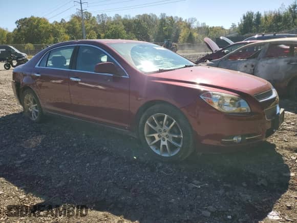 2010 Chevrolet Malibu LTZ z VIN 1G1ZE5EB2AF120406, wystawiony jako Copart lot #86856125 z przebiegiem 144 885 mil mil oraz Szkoda całkowita • Salvage title. Historia ofert i sprzedaży dostępna na DreamBid. Obrazek 4.