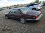 ✅ 1984 Jaguar XJ • VIN: SAJAV1348EC378486 • Лот: 71057415. Опубликован ранее на Copart с пробегом 129 417 миль. Бесплатный доступ к архиву аукционных продаж из США и подробный отчёт об истории автомобиля на DreamBid. Изображение 2.