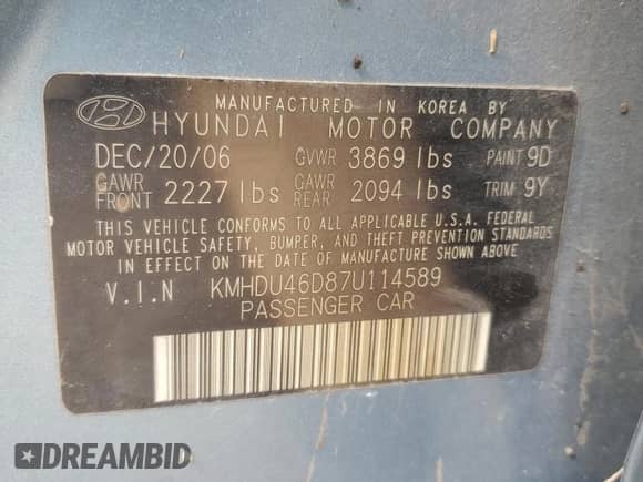 2007 Hyundai Elantra GLS z VIN KMHDU46D87U114589, wystawiony jako Copart lot #75061884 z przebiegiem 203 747 mil mil oraz Szkoda całkowita • Salvage title. Historia ofert i sprzedaży dostępna na DreamBid. Obrazek 13.