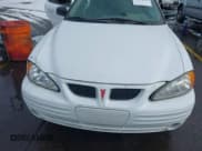 ✅ 1999 Pontiac Grand Am SE1 • VIN: 1G2NE52E3XM837376 • Lot: 41552372. Listed on IAAI with Not provided. Free auction sales archive from the USA and detailed vehicle history report at DreamBid. Image 6.