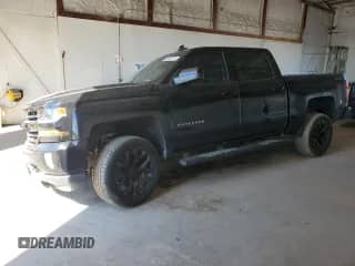 ✅ 2018 Chevrolet Silverado 1500 LT • VIN: 3GCUKREC6JG312923 • Лот: 84023175. Опубликован ранее на Copart с пробегом 129 387 миль. Бесплатный доступ к архиву аукционных продаж из США и подробный отчёт об истории автомобиля на DreamBid. Изображение 1.