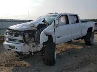 2015 Chevrolet Silverado 2500HD High Country с VIN 1GC1KXE8XFF564587, выставлен на аукционе Copart как лот 60553915 с пробегом Не указан миль и Списание • Salvage title. История ставок и продаж доступна на DreamBid. Изображение 1.