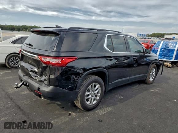 ✅ 2021 Chevrolet Traverse LT Cloth • VIN: 1GNERGKW7MJ190280 • Лот: 93726935. Опубликован ранее на Copart с пробегом 57 579 миль. Бесплатный доступ к архиву аукционных продаж из США и подробный отчёт об истории автомобиля на DreamBid. Изображение 3.
