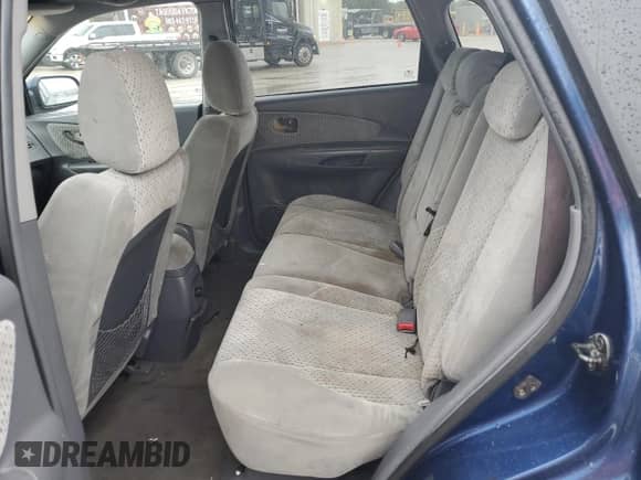 2005 Hyundai Tucson GLS z VIN KM8JN12D05U074879, wystawiony jako Copart lot #73746674 z przebiegiem Nie podano mil oraz Szkoda całkowita • Salvage title. Historia ofert i sprzedaży dostępna na DreamBid. Obrazek 11.