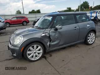 2010 MINI Hardtop S with VIN WMWMF7C5XATX42757, listed as a Copart auction lot 67225595 with 107,711 mi miles and Salvage title. Bid and sale history available at DreamBid. Image 1.
