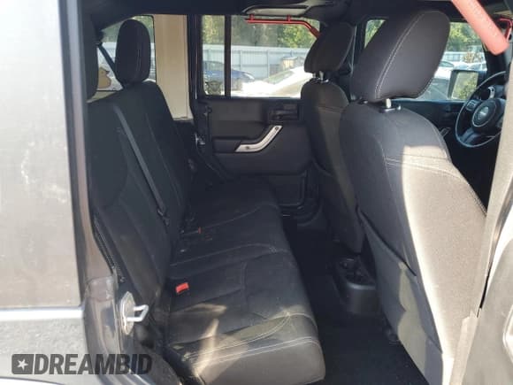 ✅ 2016 Jeep Wrangler Unlimited Rubicon • VIN: 1C4BJWFG4GL273822 • Lot: 81204445. Listed on Copart with 77,431 mi. Free auction sales archive from the USA and detailed vehicle history report at DreamBid. Image 11.