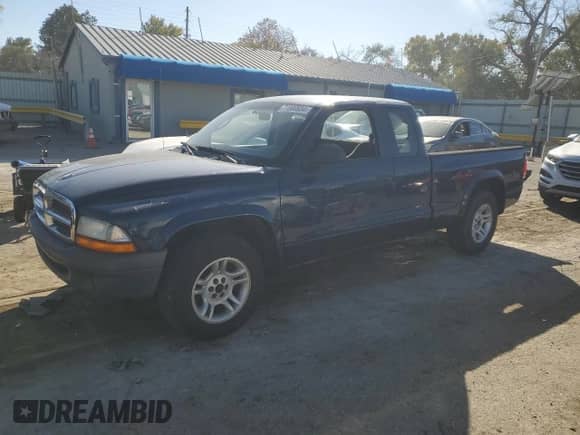 2004 Dodge Dakota с VIN 1D7GL12K24S670157, выставлен на аукционе Copart как лот 77800934 с пробегом 102 769 миль миль и Списание • Salvage title. История ставок и продаж доступна на DreamBid. Изображение 1.