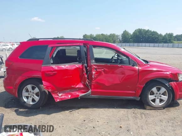 2013 Dodge Journey American Value with VIN 3C4PDCAB7DT500881, listed as a IAAI auction lot 43193439 with 165,029 mi miles and . Bid and sale history available at DreamBid. Image 13.