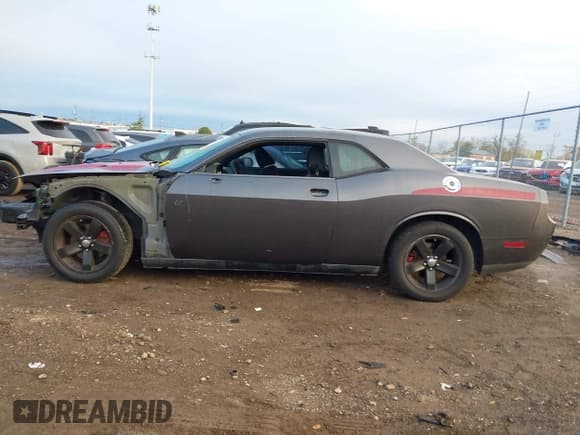 ✅ 2013 Dodge Challenger SXT • VIN: 2C3CDYAG0DH665966 • Lot: 43543054. Listed on IAAI with 128,859 mi. Free auction sales archive from the USA and detailed vehicle history report at DreamBid. Image 15.