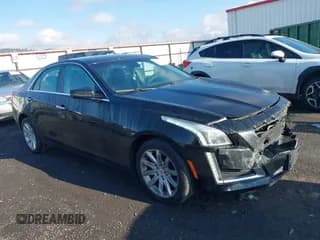 ✅ 2014 Cadillac CTS AWD • VIN: 1G6AW5SX1E0159081 • Лот: 43656547. Опубликован ранее на IAAI с пробегом 105 828 миль. Бесплатный доступ к архиву аукционных продаж из США и подробный отчёт об истории автомобиля на DreamBid. Изображение 1.