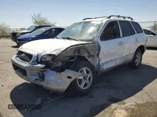 2004 Hyundai Santa Fe GLS z VIN KM8SC13E84U713106, wystawiony jako Copart lot #61865775 z przebiegiem 174 358 mil mil oraz Szkoda całkowita • Salvage title. Historia ofert i sprzedaży dostępna na DreamBid. Obrazek 1.