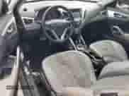 2012 Hyundai Veloster w/Red Int z VIN KMHTC6AD5CU030340, wystawiony jako Copart lot #45793405 z przebiegiem 139 667 mil mil oraz Czysty tytuł • Clean title. Historia ofert i sprzedaży dostępna na DreamBid. Obrazek 8.