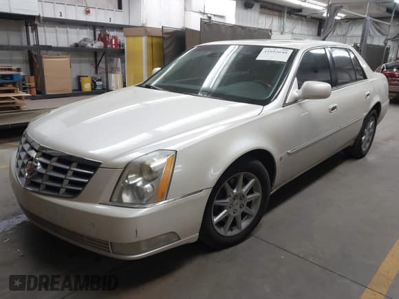 ✅ 2009 Cadillac DTS 1SA • VIN: 1G6KD57Y59U119533 • Lot: 41892648. Listed on IAAI with 177,685 mi. Free auction sales archive from the USA and detailed vehicle history report at DreamBid. Image 2.