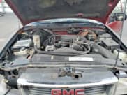 ✅ 2000 GMC Jimmy SLE • VIN: 1GKCS13WXY2357087 • Лот: 60999105. Опубликован ранее на Copart с пробегом 90 017 миль. Бесплатный доступ к архиву аукционных продаж из США и подробный отчёт об истории автомобиля на DreamBid. Изображение 12.