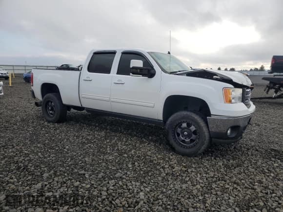 ✅ 2013 GMC Sierra 2500HD SLT • VIN: 1GT121C82DF155822 • Lot: 92244665. Listed on Copart with 148,669 mi. Free auction sales archive from the USA and detailed vehicle history report at DreamBid. Image 4.