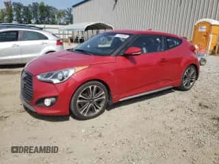 2016 Hyundai Veloster Turbo с VIN KMHTC6AE7GU286767, выставлен на аукционе Copart как лот 70764284 с пробегом 77 022 миль миль и Списание • Salvage title. История ставок и продаж доступна на DreamBid. Изображение 1.