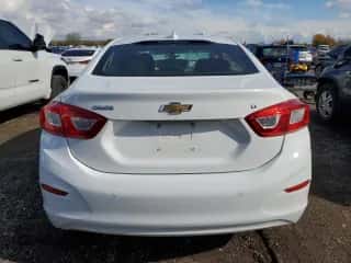 2017 Chevrolet Cruze LT z VIN 3G1BE5SM0HS604023, wystawiony jako Copart lot #83956725 z przebiegiem 196 671 mil mil oraz Szkoda całkowita • Salvage title. Historia ofert i sprzedaży dostępna na DreamBid. Obrazek 6.