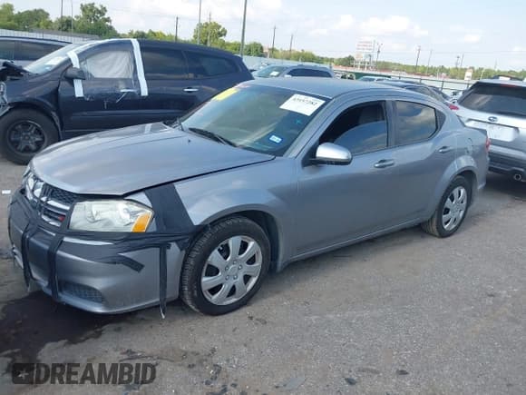 ✅ 2014 Dodge Avenger SE • VIN: 1C3CDZABXEN110199 • Lot: 43157282. Listed on IAAI with 177,058 mi. Free auction sales archive from the USA and detailed vehicle history report at DreamBid. Image 2.