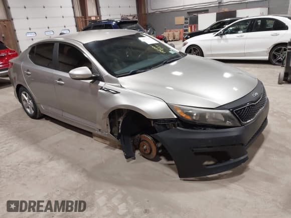 ✅ 2015 Kia Optima LX • VIN: 5XXGM4A74FG355766 • Lot: 42343497. Listed on IAAI with 155,482 mi. Free auction sales archive from the USA and detailed vehicle history report at DreamBid. Image 1.