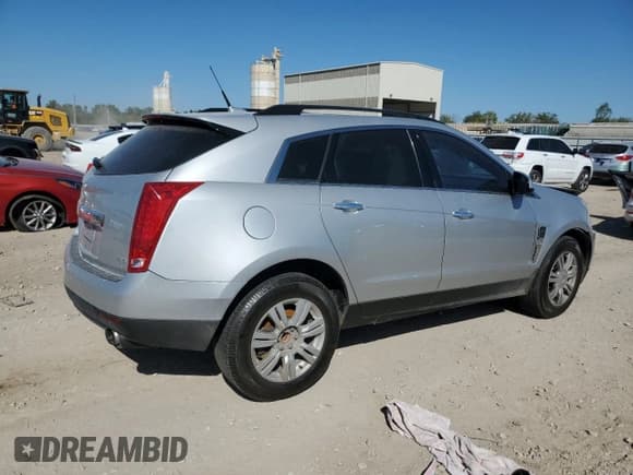 ✅ 2012 Cadillac SRX • VIN: 3GYFNGE37CS587957 • Лот: 82317315. Опубликован ранее на Copart с пробегом Не указан. Бесплатный доступ к архиву аукционных продаж из США и подробный отчёт об истории автомобиля на DreamBid. Изображение 3.