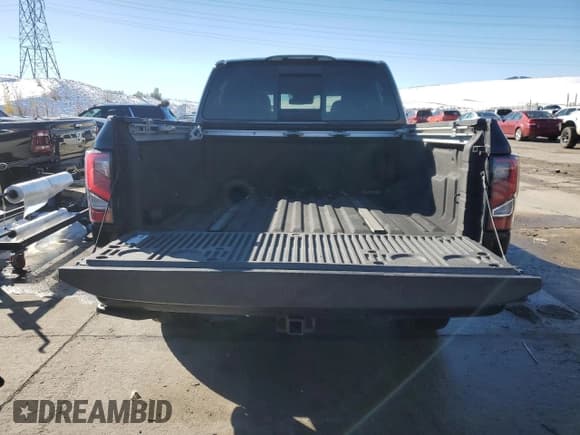 ✅ 2020 Nissan Titan SL • VIN: 1N6AA1ED1LN506475 • Lot: 79719974. Wystawiony na Copart z przebiegiem 94 564 mil. Bezpłatny archiwum sprzedaży aukcyjnych z USA i szczegółowy raport historii pojazdu na DreamBid. Zdjęcie 6.