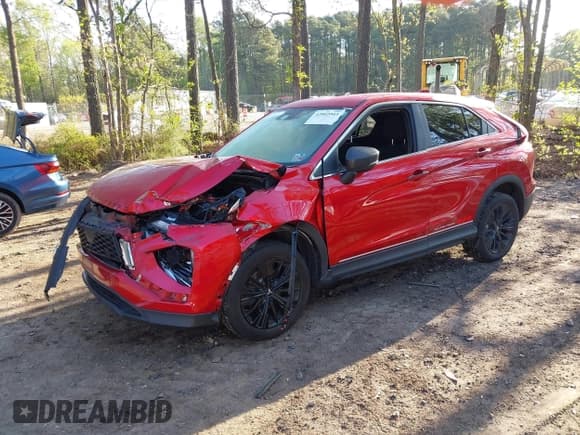 ✅ 2022 Mitsubishi Eclipse Cross LE • VIN: JA4ATVAA2NZ028668 • Lot: 42002943. Listed on IAAI with 77,067 mi. Free auction sales archive from the USA and detailed vehicle history report at DreamBid. Image 2.