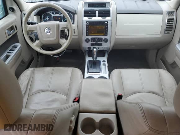2010 Mercury Mariner Premier с VIN 4M2CN9HG1AKJ28171, выставлен на аукционе Copart как лот 80882805 с пробегом 124 347 миль миль и Списание • Salvage title. История ставок и продаж доступна на DreamBid. Изображение 8.
