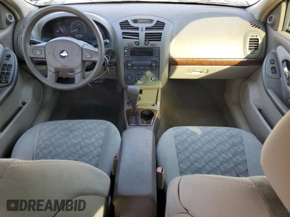 2005 Chevrolet Malibu LS z VIN 1G1ZT54805F285601, wystawiony jako Copart lot #75038064 z przebiegiem 463 039 mil mil oraz Szkoda całkowita • Salvage title. Historia ofert i sprzedaży dostępna na DreamBid. Obrazek 8.